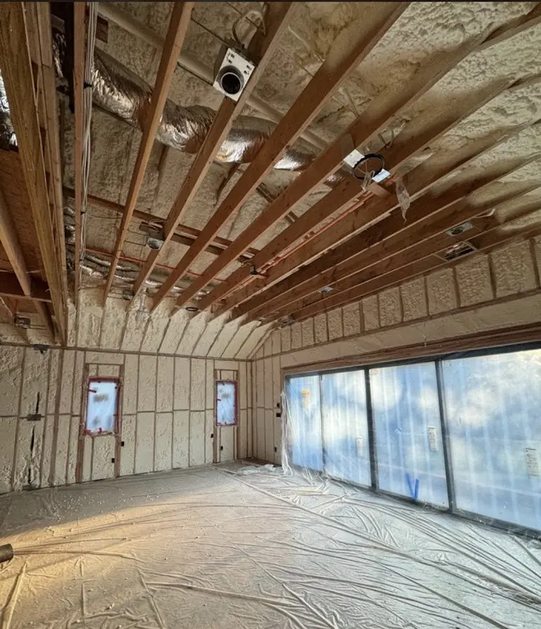 Interior walls and ceiling insulated with spray foam during new construction in Cape Elizabeth
